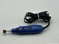 Full view of Top Paw electric nail grinder with sanding drum and cord