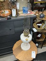 Full view of Aladdin Lincoln Drape oil lamp with chimney