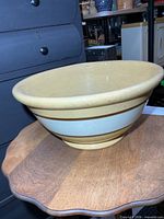 Side view of stoneware bowl showing banded design