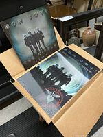 Poster and tour book inside original shipping box