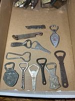Box showing 12 openers plus bag of extras