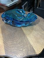 Angled view of blue Chalet glass dish on table