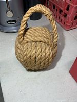 Front view of spherical rope knot with loop handle