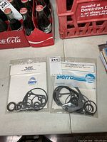 Both sealed Sierra gear housing seal kits side by side