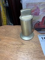 Full view of Zippo table lighter standing upright