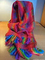 Full view of scarf draped, showing chevron pattern and fringe