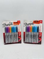 Two sealed 8-count Sharpie Fine Point marker packs front view
