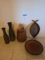 Full view of all five decorative pieces on floor