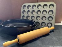 Roasting pan, mini muffin tin, rolling pin grouped