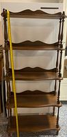 Full front view showing five shelves and height tape