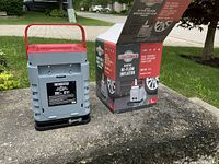Pump positioned beside original box