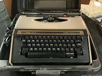Top view of Sears Celebrity Auto 12 typewriter showing keyboard and brand label
