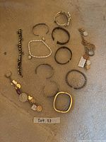 All 15 bracelets arranged together on carpet