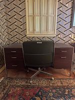 Desk rear view with chair tucked in