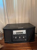 Front view of TEAC GF-350 showing control panel and speakers