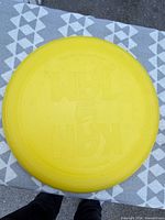 Top view of yellow KAM JAM disc