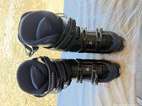 Top view of both Rossignol Salto ski boots showing liners, buckles and branding