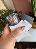 Boxed Avon jewellery set still in outer sleeve held in hand