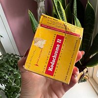 Front of Kodak Kodachrome II film box showing branding and damage