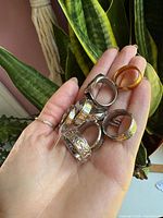 All six rings displayed on hand