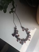 Full view of necklace showing bead arrangement and chain