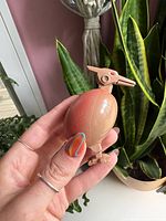 Toy transformed to bird form held in hand