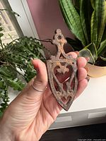Front view showing heart cut-out and overall shape