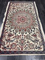 Full view of Kashmar Persian rug showing entire pattern and fringe