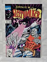 Front cover displaying title, issue number, Marvel Comics logo, and Deathlok vs Sleepwalker artwork