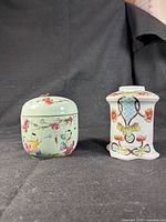 Front view of both porcelain pieces side by side