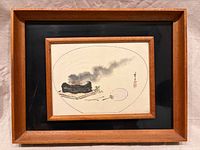 Front view showing framed artwork, wood frame, black mat