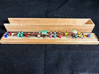 Full set arranged in wooden display box