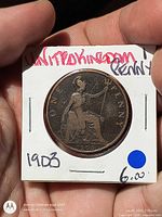 Reverse side showing seated Britannia, denomination, date