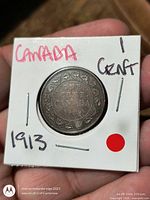 Obverse side showing KING GEORGE V portrait in holder
