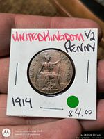 Reverse of 1914 halfpenny showing Britannia, denomination and date