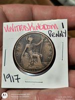Reverse side showing seated Britannia and 1917 date