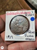Reverse side of 1919 penny in 2x2 holder showing Britannia design and date