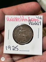 Reverse Britannia side of 1925 half penny in 2×2 holder with handwritten id