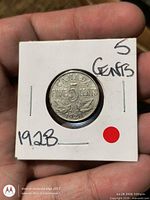 Reverse side showing denomination, date and Canada legend in flip