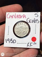 Reverse side showing CANADA FIVE CENTS 1930 in cardboard flip