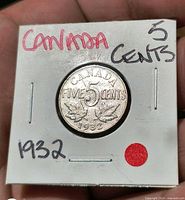 Reverse of 1932 Canadian 5-cent coin in labeled 2x2 flip