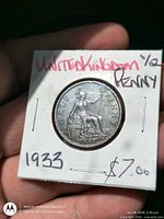 Reverse side of 1933 UK half penny in 2x2 flip