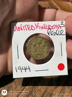 Reverse of 1944 threepence in 2×2 holder showing thrift design and date
