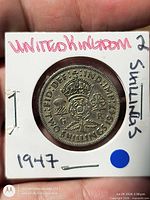 Reverse side showing crowned Tudor rose and denomination