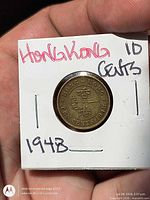 Reverse view showing date, denomination and bilingual text