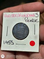 Reverse in holder showing crowned portcullis and date 1953