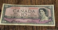 Front of 1954 Canadian $10 bill showing portrait, serial number 39766856 and signatures