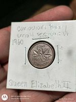 Obverse and holder notes visible