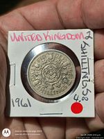 Reverse side of 1961 UK florin showing Tudor rose design and denomination