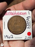 Obverse view of bronze 1962 UK one penny coin in flip